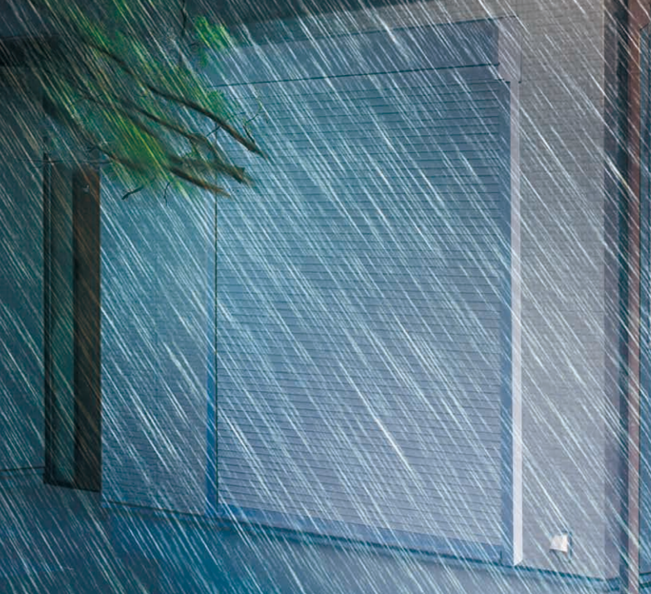 毎年のように発生する大型台風や、線状降水帯による局地的なゲリラ豪雨から大切なものを守るシャッターのイメージ